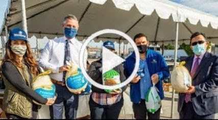 Families Receive Hundreds of Turkeys For Thanksgiving